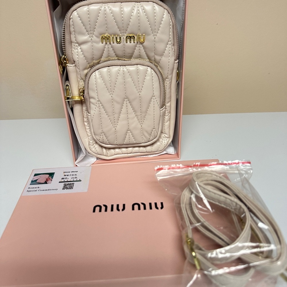 Miu Miu Quilted Leather Crossbody Bag in Beige
